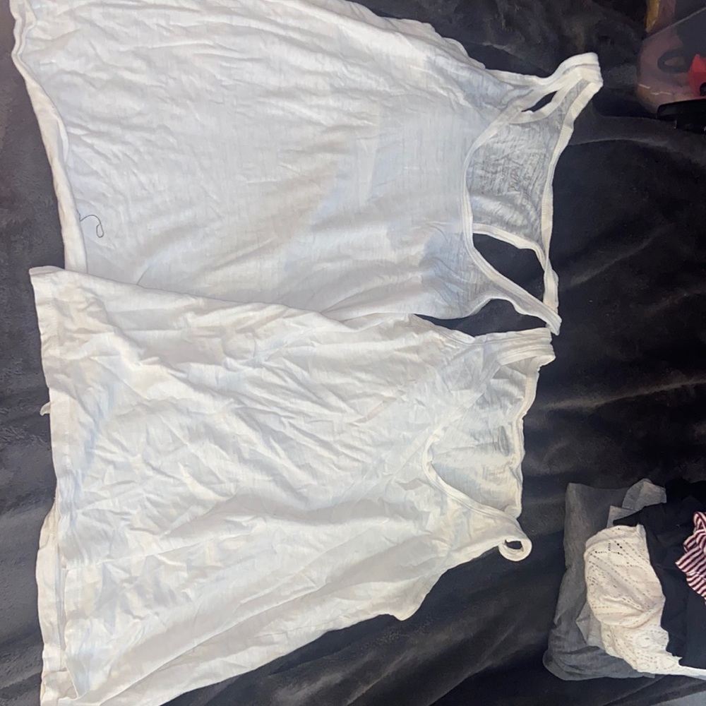 Two white tank tops never worn
